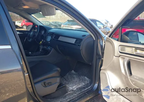 2014 Volkswagen Touareg 3.6L Sport z USA, uszkodzony, nr VIN WVGEF9BP2ED008972